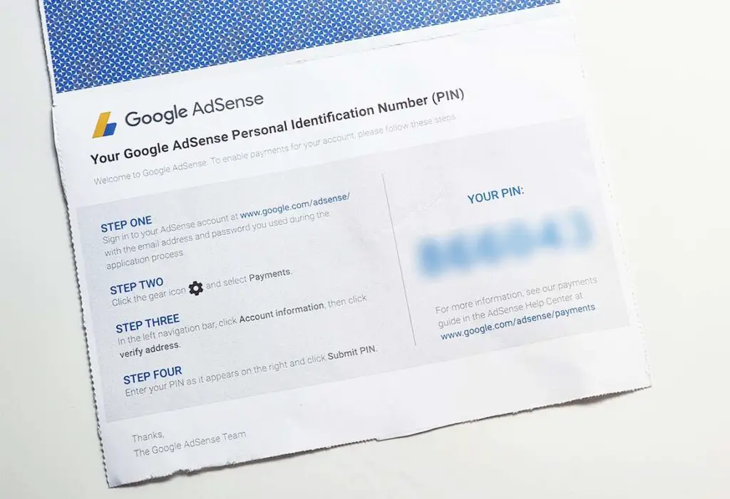 Here is what the Google AdSense verification letter looks like inside (personal details blurred out).