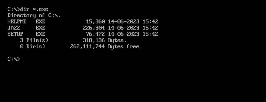 To quickly find your .exe game executable files in the MS-DOS filesystem in DosBox, use the wildcard search feature as shown on the image.