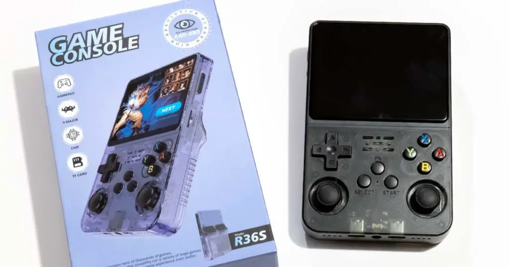 R36S handheld emulator console unboxed.