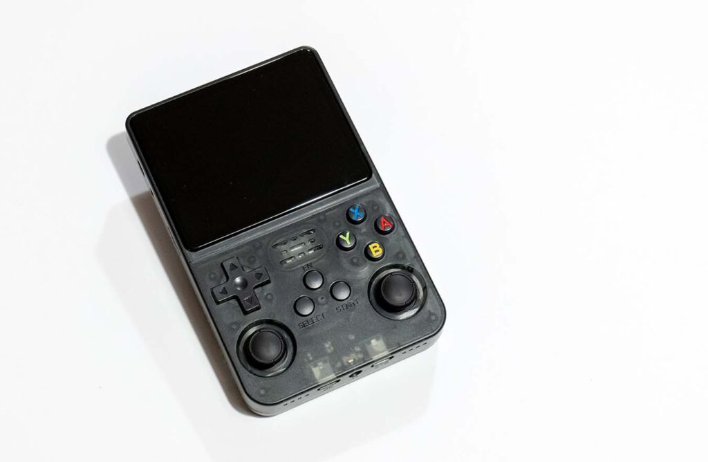 R36S handheld emulator console top view.