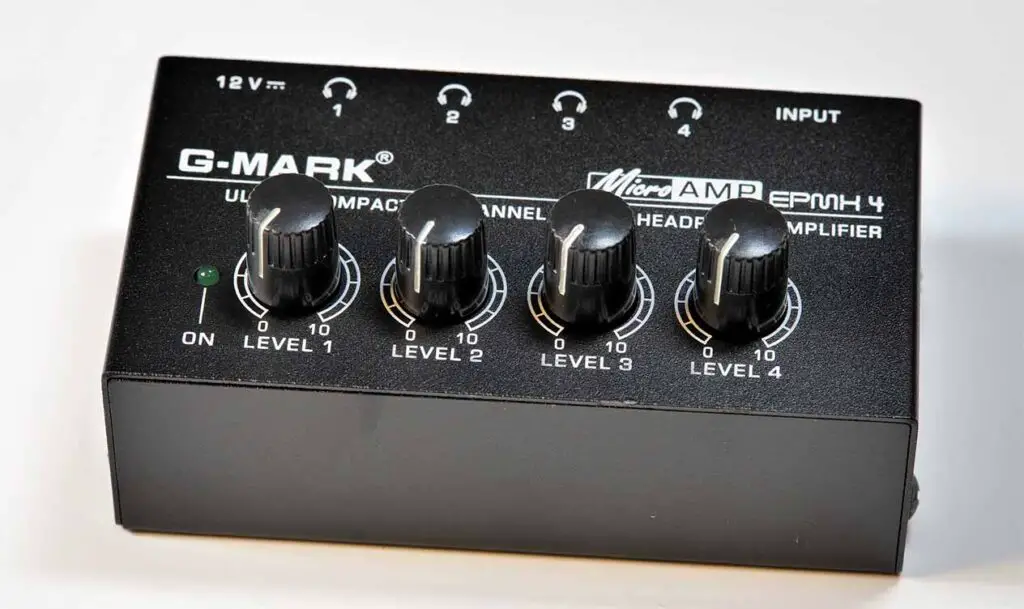 G-MARK EPMH4 4-channel stereo headphone splitter and amplifier closeup shot.