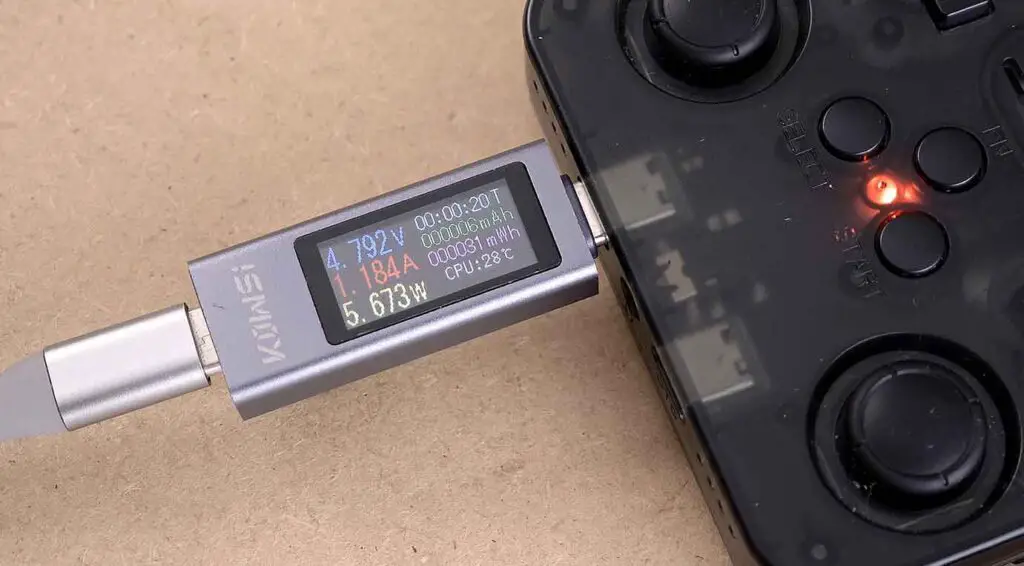 The dongle connected to the R36S handheld.