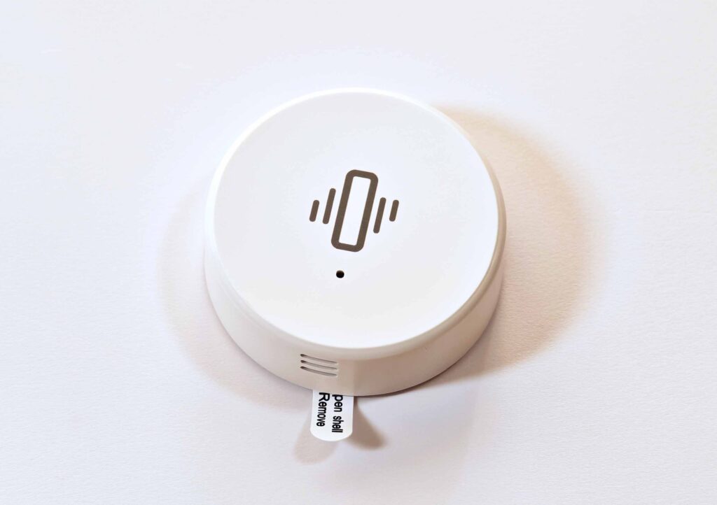 Tuya TS0210 Zigbee vibration sensor closeup.