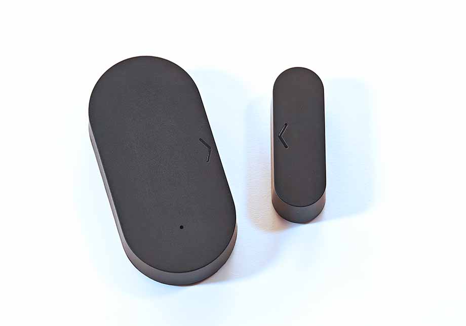 Black version of a Zigbee door and window contact sensor.
