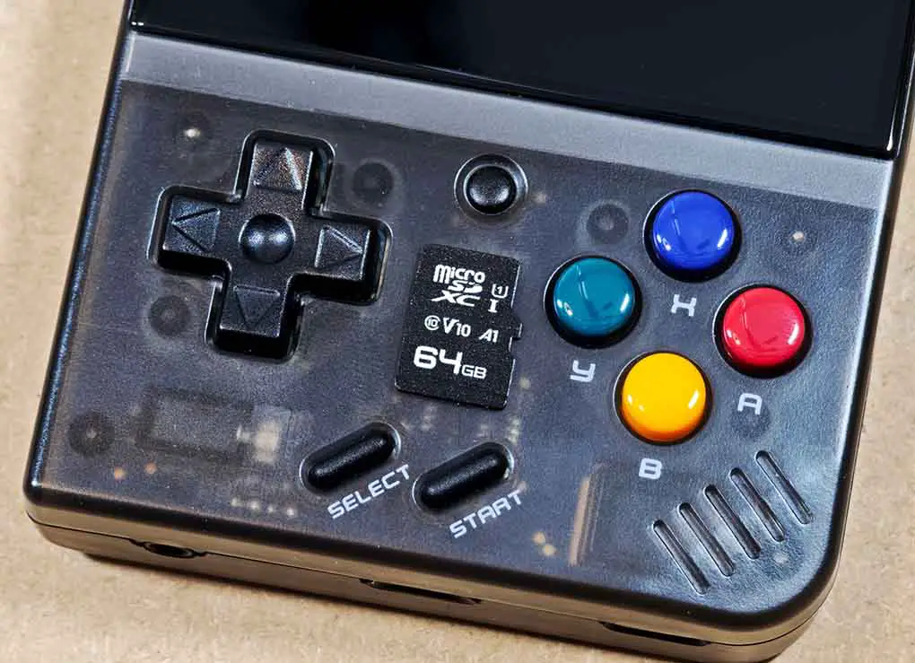 New replacement microSD laying on top of the Miyoo Mini.