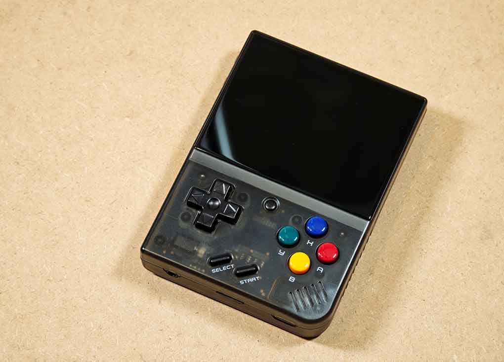 Miyoo Mini Plus retro handheld on the table.