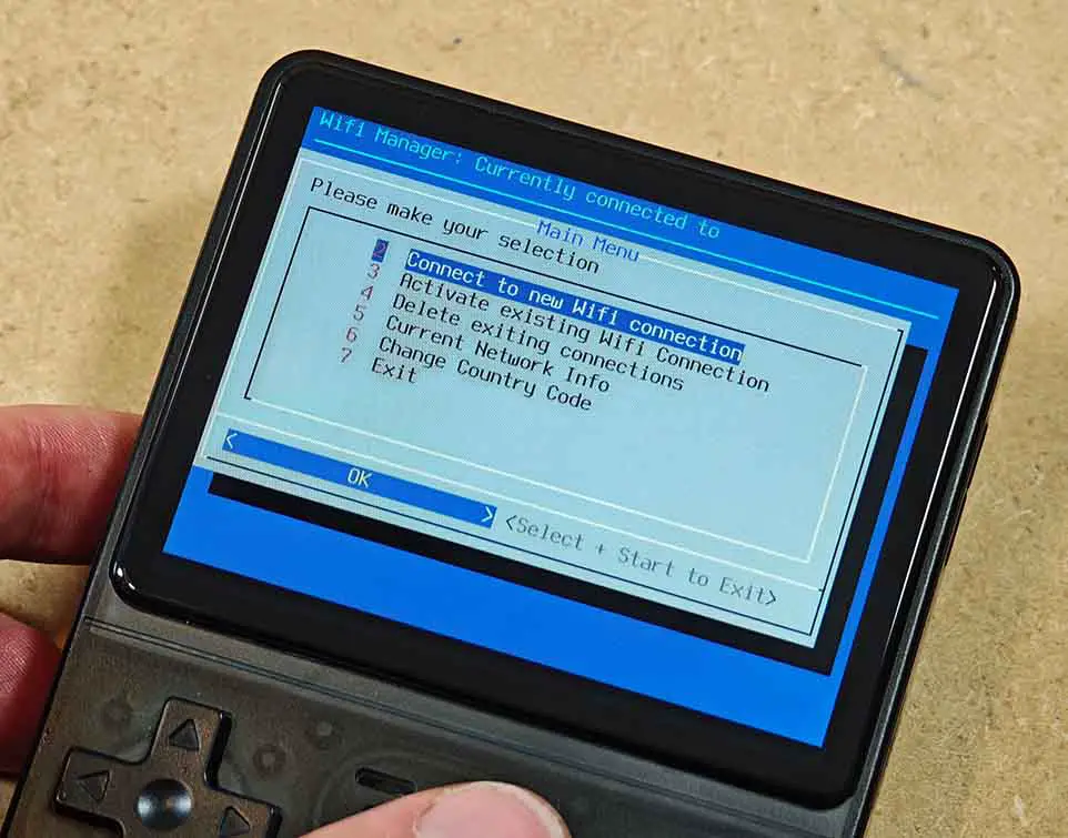 R36S Wi-Fi Manager screen with options to connect to a new Wi-Fi network and manage saved connections.