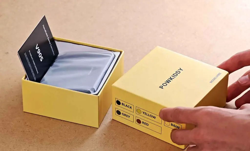 Powkiddy V90S box opened during the unboxing.