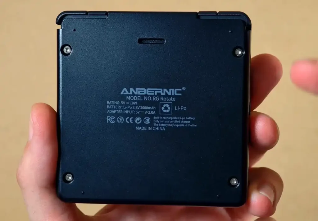 The flat back shell of the RG Rotate with the model label, speaker opening and four bottom screws.