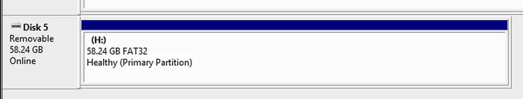 Windows Disk Management showing the Jaster 64GB microSD card as a 58.24GB FAT32 volume.