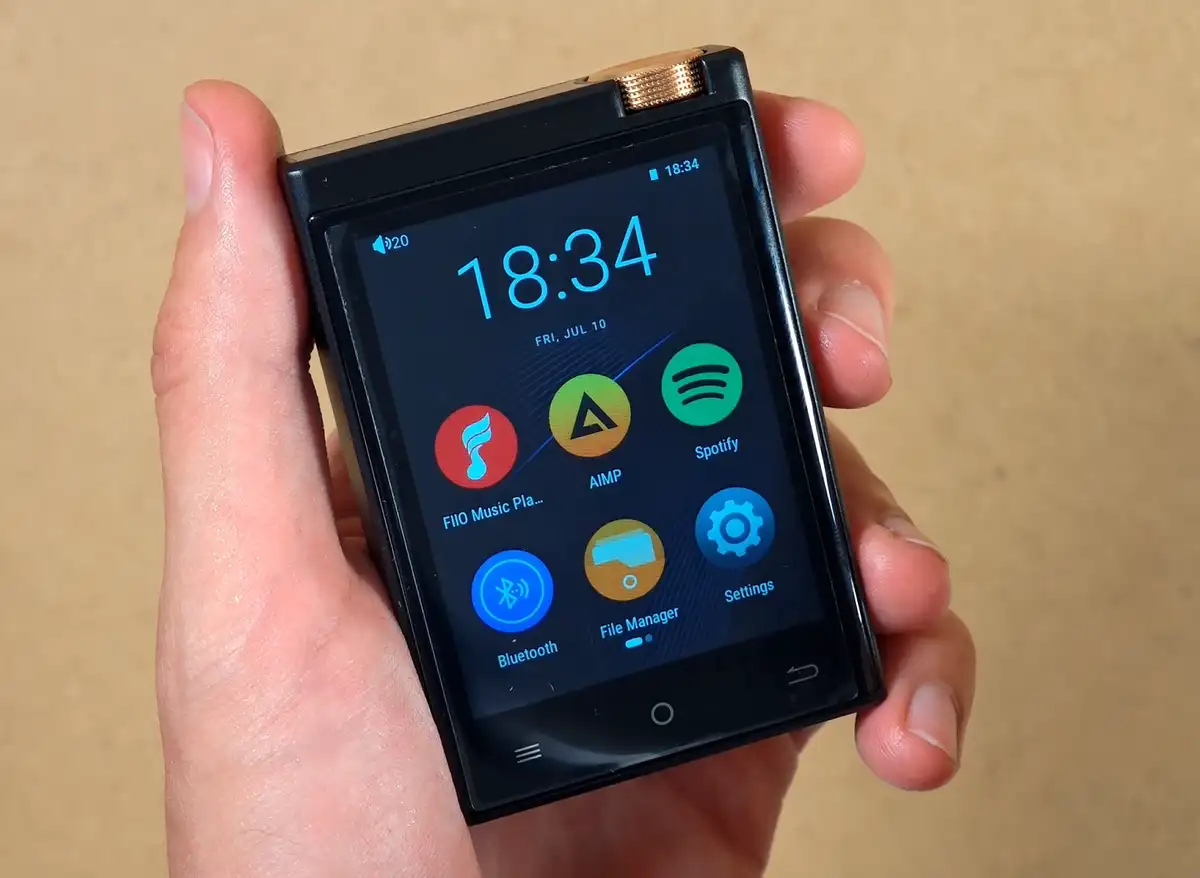 Oilsky M308 Android digital audio player held in hand