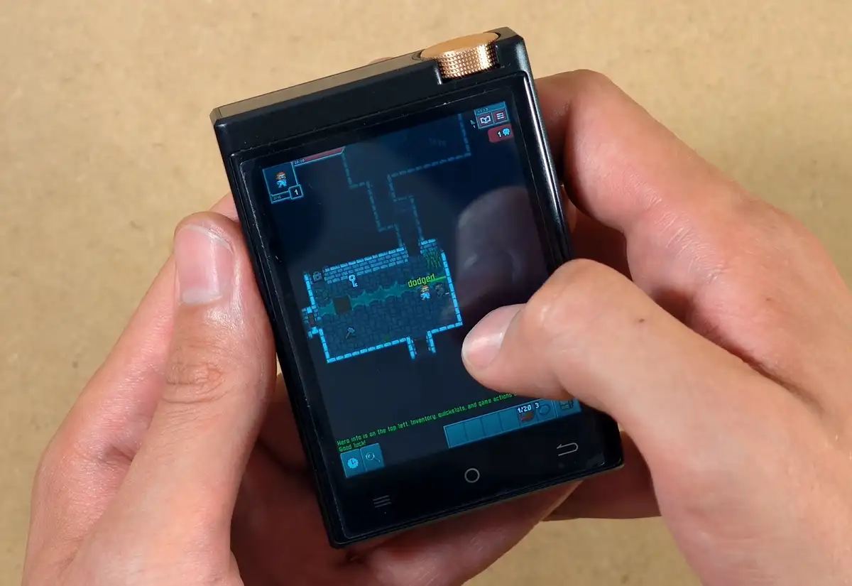 Pixel Dungeon running on the Oilsky M308 touchscreen.