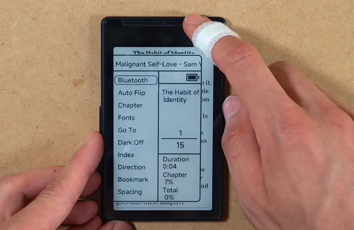The device being used upside down with the reading menu open.