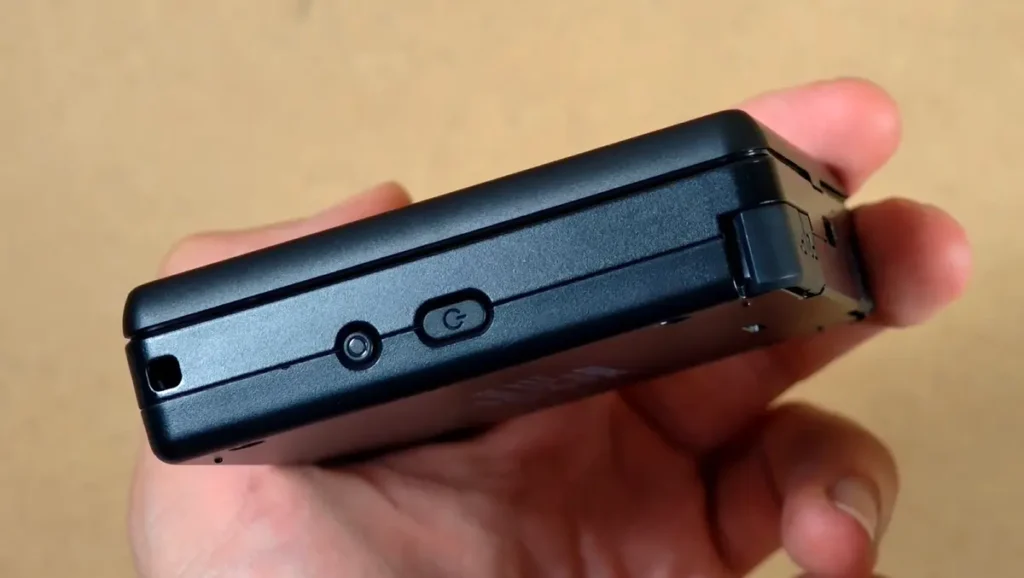 The right side of the RG Rotate with the lanyard slot, function button and power button.