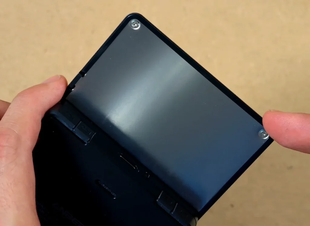 Close-up of the screws on the back of the RG Rotate display assembly.