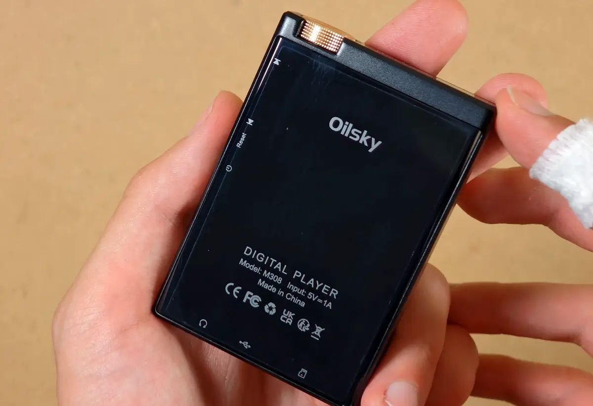 Glossy back and side control labels on the Oilsky M308.