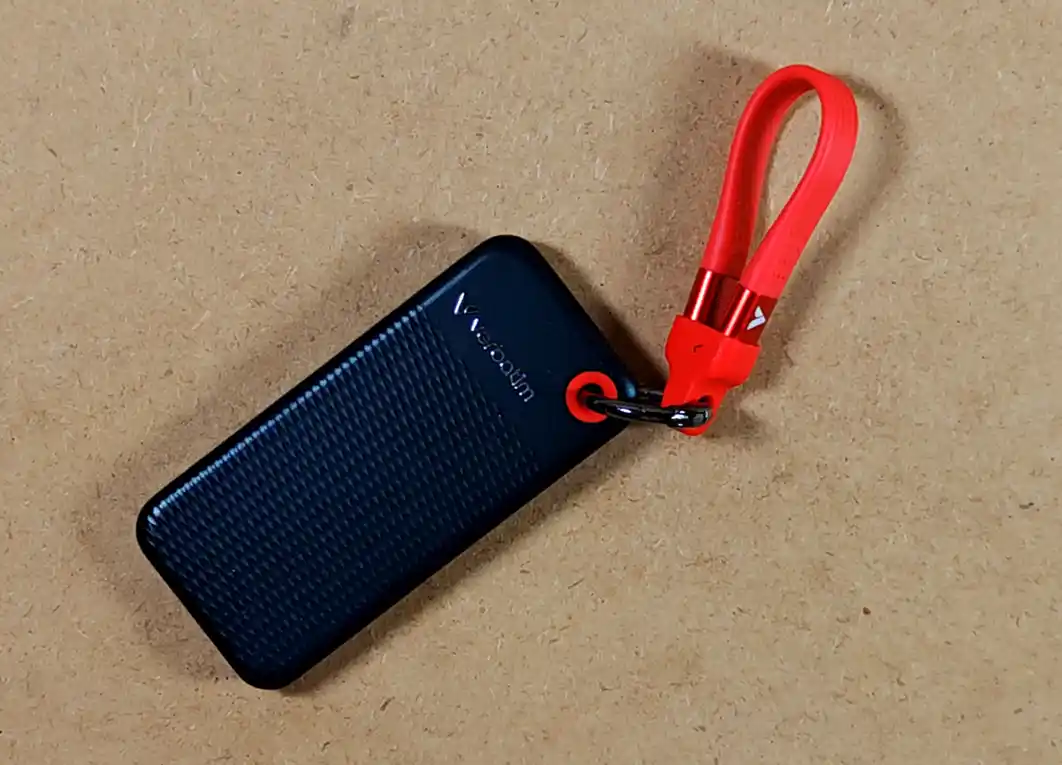Top view of the Verbatim Pocket SSD with its USB-C cable loop extended.