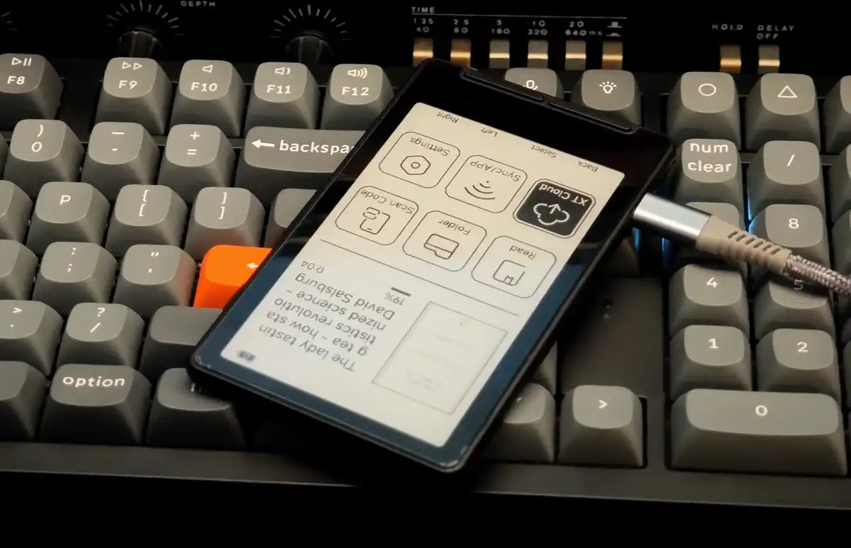 The base Xteink X4 charging through its side USB-C port.