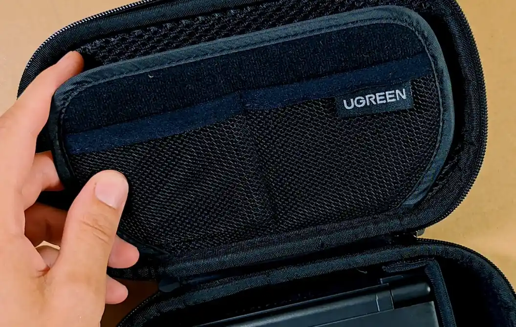 The padded divider covering the top part of the AYN Thor inside the case.