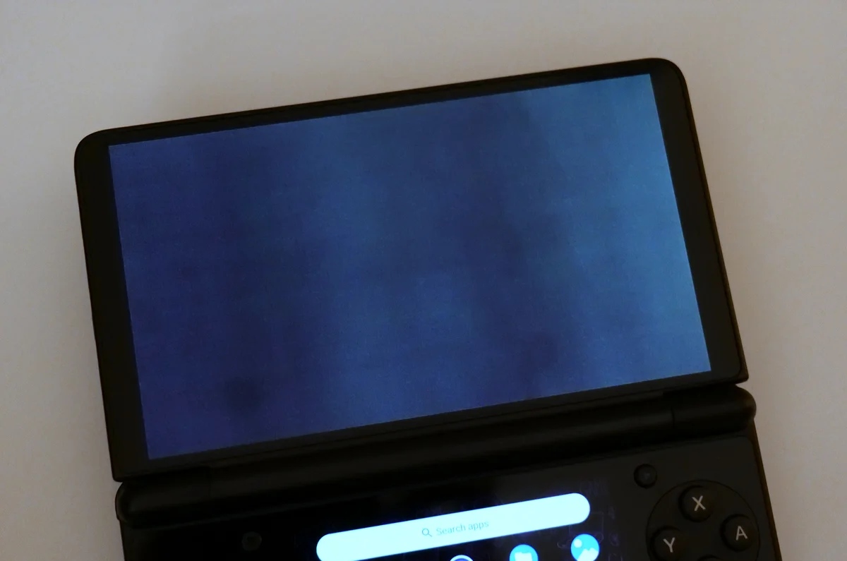 AYN Thor top OLED display at 10 percent gray setting with Ultra Black mode disabled.