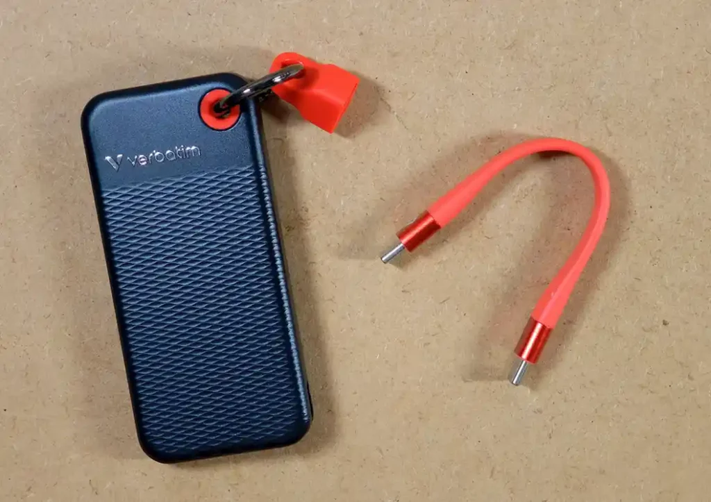 The Verbatim Pocket SSD and its short red USB-C cable shown separately.
